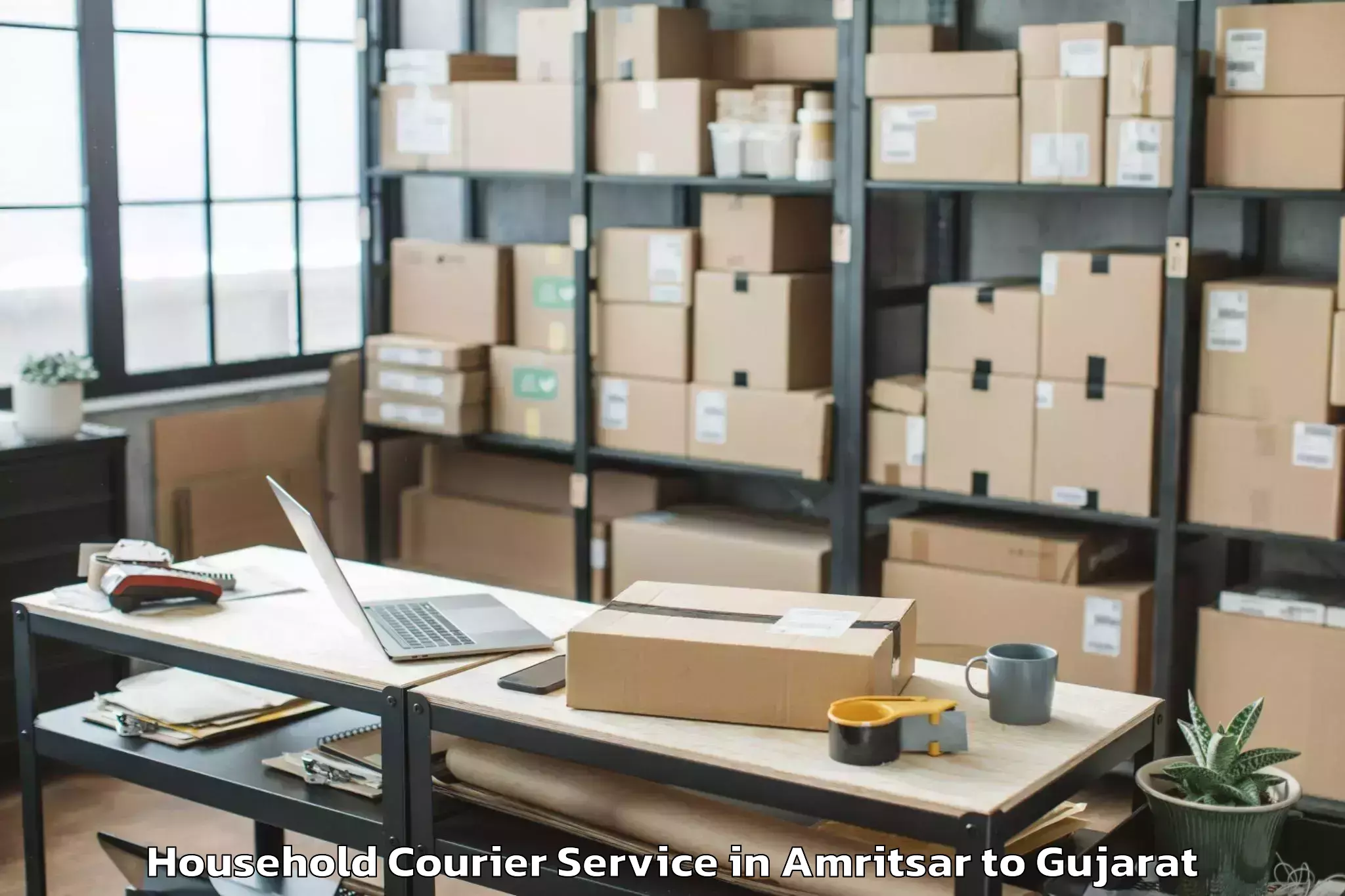 Top Amritsar to Khambhalia Household Courier Available